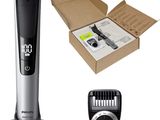 a silver and black electric shaver and a box of hair clippers