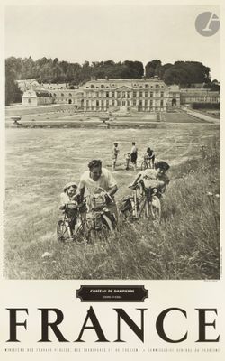 black and white photograph of a group of people riding bicycles in a field