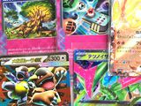 many different types of pokemon cards displayed on a table