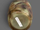 a vase that has a label on it