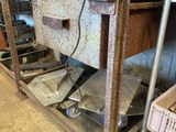 a workbench with a drawer on it in a garage