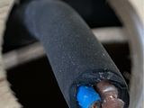 an image of a close up of a piece of electrical wire