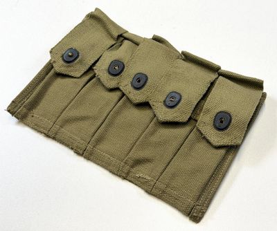 un gros plan d'une pochette à enrouler ornée de boutons
