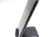 a close up of a cell phone on a stand