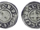 une pièce d'argent avec une croix au recto et une croix au verso