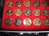 a red case with a lot of coins in it