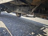 a close up view of a flatbed truck on the road