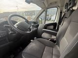 a view of the inside of a van from the driver ' s seat