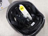 a helmet with a sticker on it sitting on a table