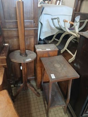 several pieces of furniture are stacked on top of each other in a room