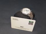 a watch that is sitting on top of a card