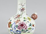 chinese porcelain vase with flowers and birds painted on it