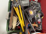 a pile of assorted tools and tools in a bin