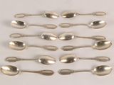 a lot of spoons that are sitting on a table
