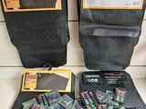 several pieces of luggage sitting on top of a counter next to other items