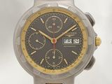 a silver and gold watch with a black face