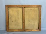 an old wooden frame with a window and a window pane