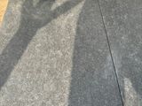 a sign on the floor of a building that has been built