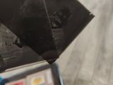 a person holding a piece of paper in their hand