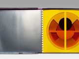 a book with a picture of an orange and yellow circle