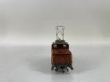 a close up of a toy train on a white surface