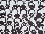 a lot of black and white pandas that are all together