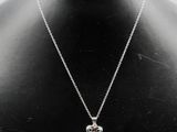 a close up of a necklace on a mannequin mannequin