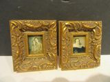 pair of antique gold picture frames of a man and a woman