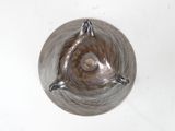 a picture of a metal object on a white surface