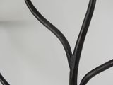 a close up of a metal tree with no leaves