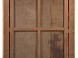 an old wooden window with a glass pane on the side of it