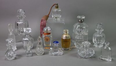 a lot of glass bottles that are sitting on a table
