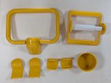 a picture of a set of yellow objects on a table