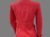 a close up of a red jacket on a mannequin mannequin mannequin mannequin mannequin mannequin mannequin manne