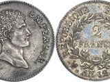 une pièce d'argent portant l'image d'un homme