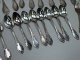 a lot of spoons and spoon spoons on the table