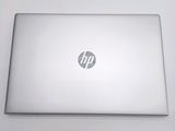 a laptop that is sitting on a white table