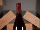 a bottle of wine that is sitting on a table