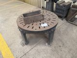 a fire pit that is sitting in the middle of a parking lot