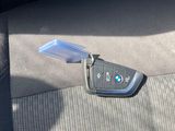 a car key that is sitting on the seat of a car
