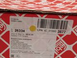 a red box with a white and yellow label on it