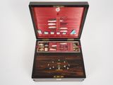 a wooden box with a bunch of items inside of it