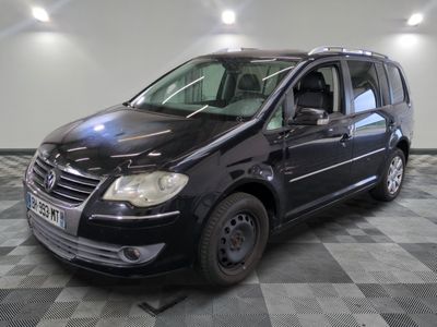 a picture of a black van parked in a garage