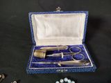 an image of a set of tools in a case on a table