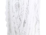 white sheery fabric with silver flowers on it on a white background