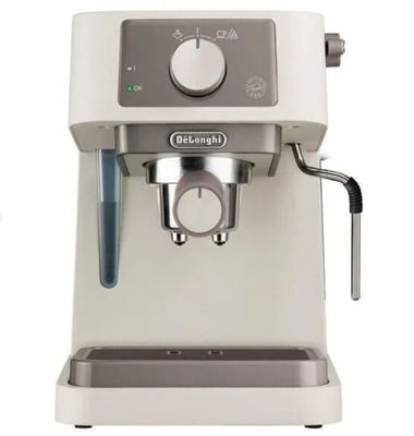an image of a coffee machine with a cup on top of it