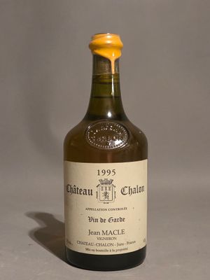 a bottle of wine that is sitting on a table