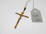 a close up of a cross with a price tag attached to it