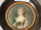 a picture of a woman in a dress on a plate