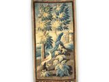 an image of a tapestry hanging on the wall of a room
